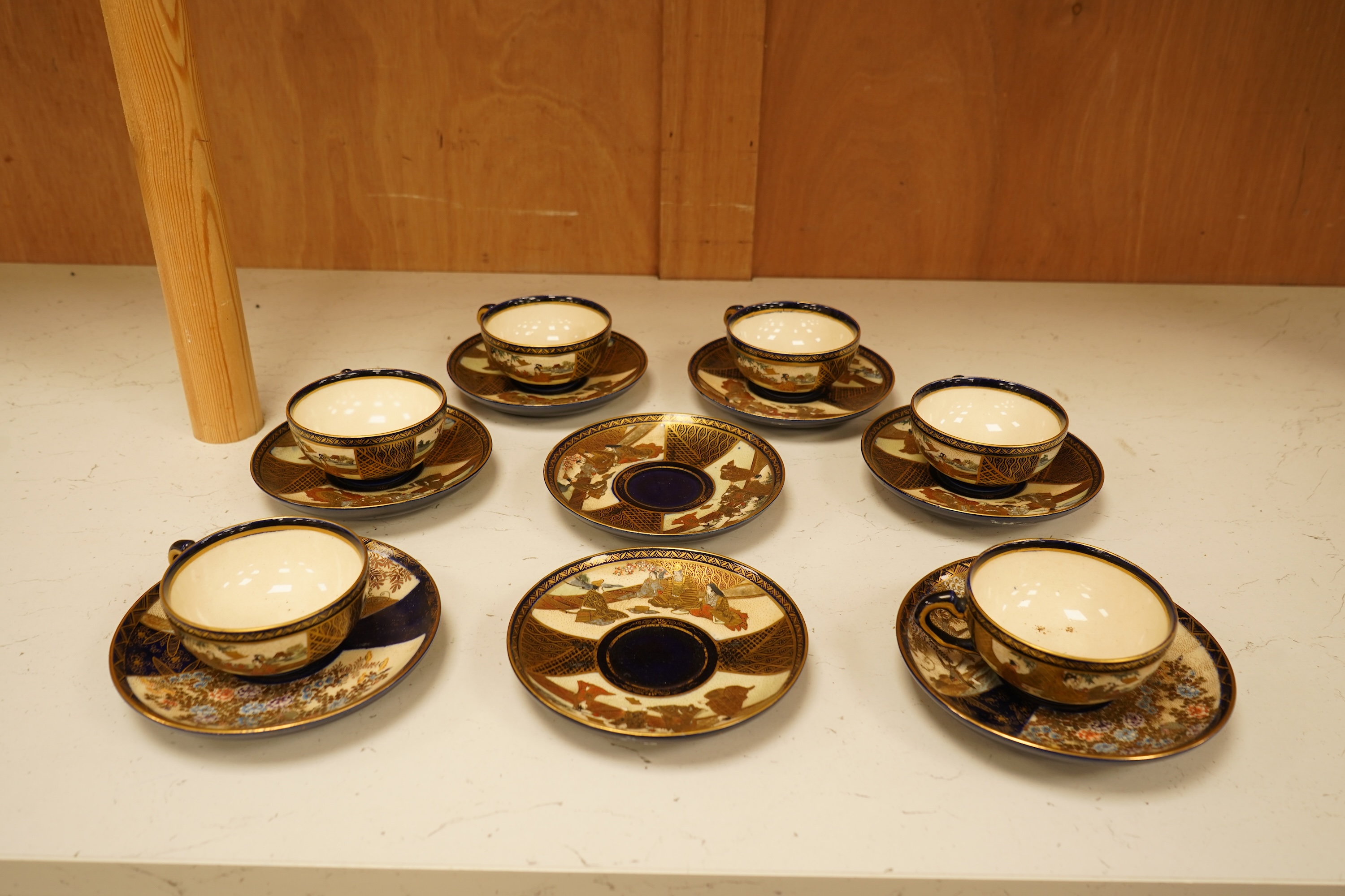 A set of six Japanese Satsuma pottery teacups and saucers, and two further saucers